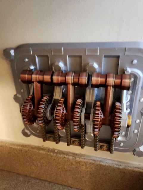 Triple Gear and Lever Light Switch Plate