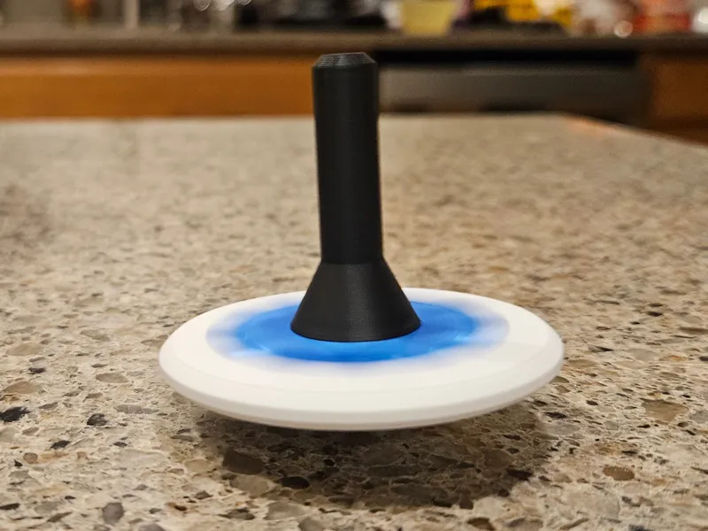 Spinning Top with changeable decoration