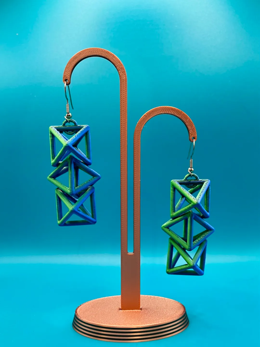Triple octahedra on edge earrings view 2