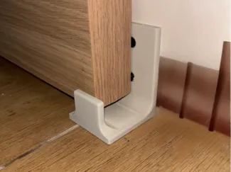 Wall attached barn door guide