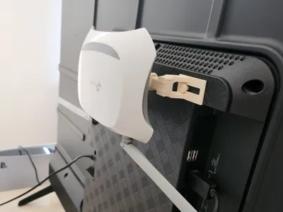 Mount for the wifi router to the TV