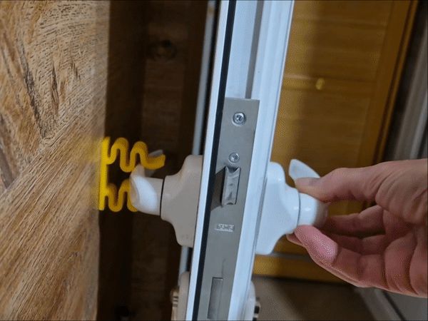 Door stopper and holder - spring form