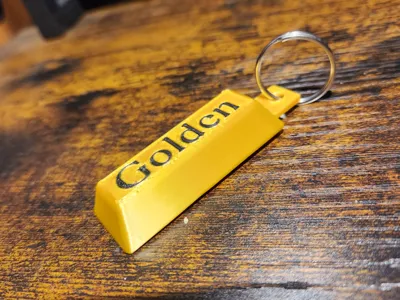 Golden Huntr/x keychain 