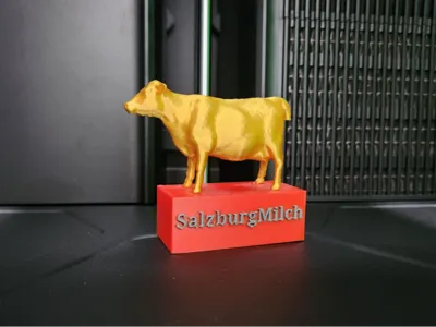 SalzburgMilch Decorative Cow on Pedestal