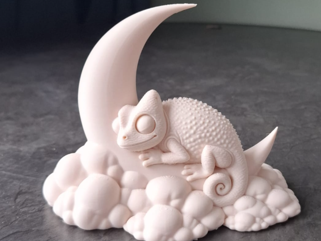 Cute Chameleon on Crescent Moon