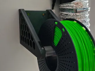 Wall mounted spool holder