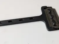 Racloir monobloc pour lame de rasoir à double tranchant — photo 1