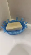 With drainage holes and slanting inner surface
