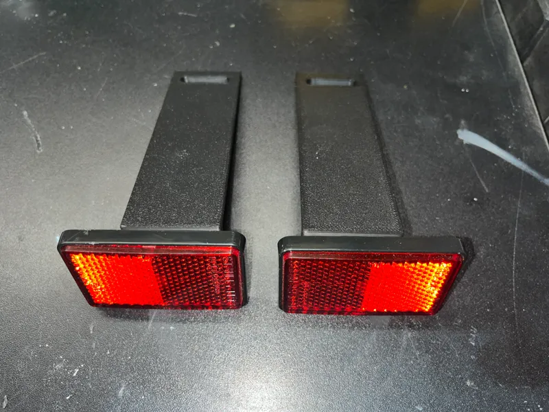 SOPORTE CATADIOPTRICOS PARA PORTAMTRICULAS CORTO