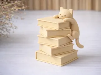 Cute Cat on Stack of Books