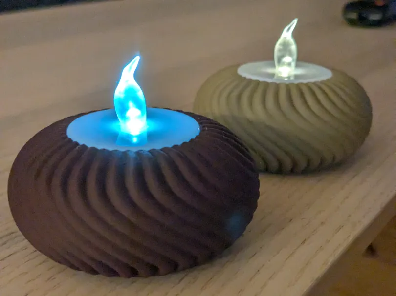 Mini Ribbed Tea Lights Modern ribbed LED tea light holder - Free 3D Print Model - MakerWorld