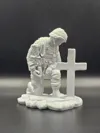 Kneeling at the cross Soldier