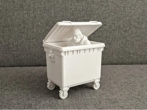 Homeless Man in Dumpster