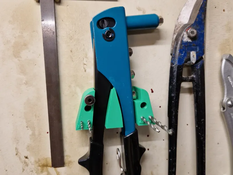 Holder for pop rivet pliers