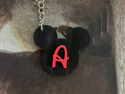 Initials with Mickey's silhouette