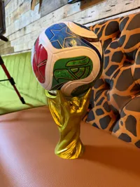 0.08mm layer, 4 walls, 7% infill (Size 5 Football Stand)