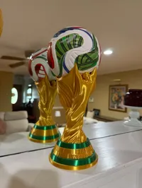 0.08mm layer, 4 walls, 7% infill (Size 1 Football Stand)