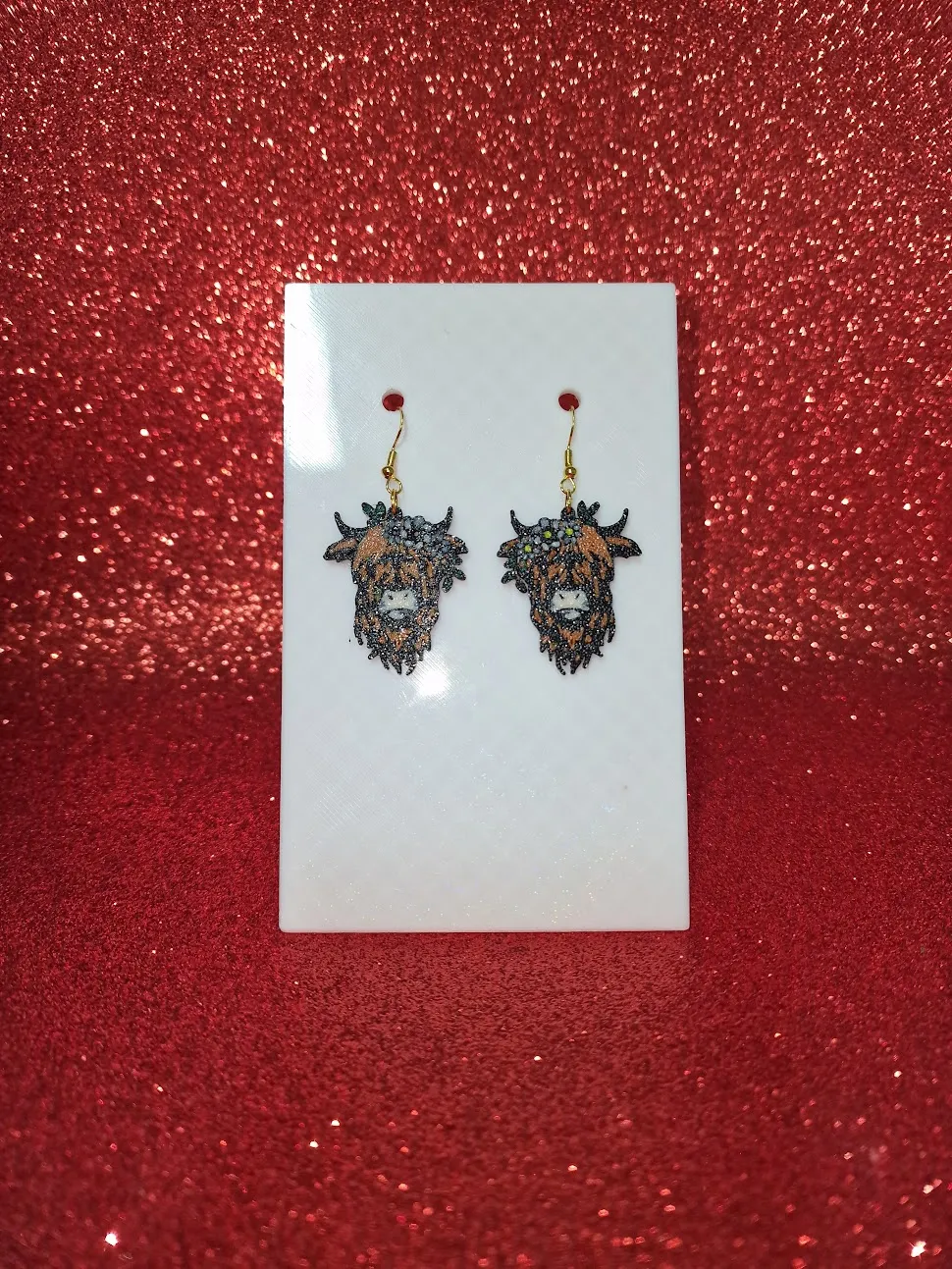 Flower cow earrings view 2