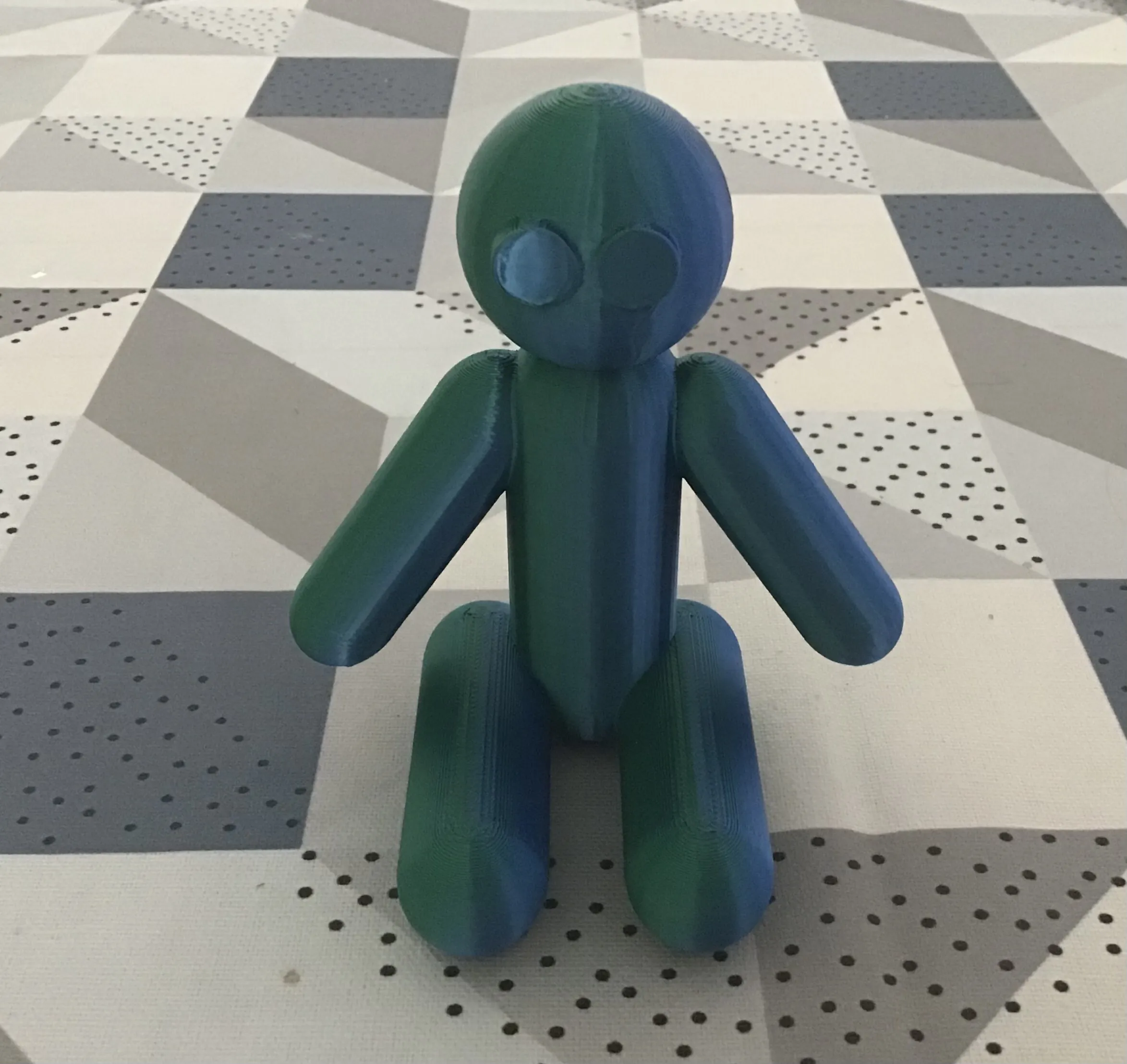 Miniatura 1 do modelo 3D Monigote sentado