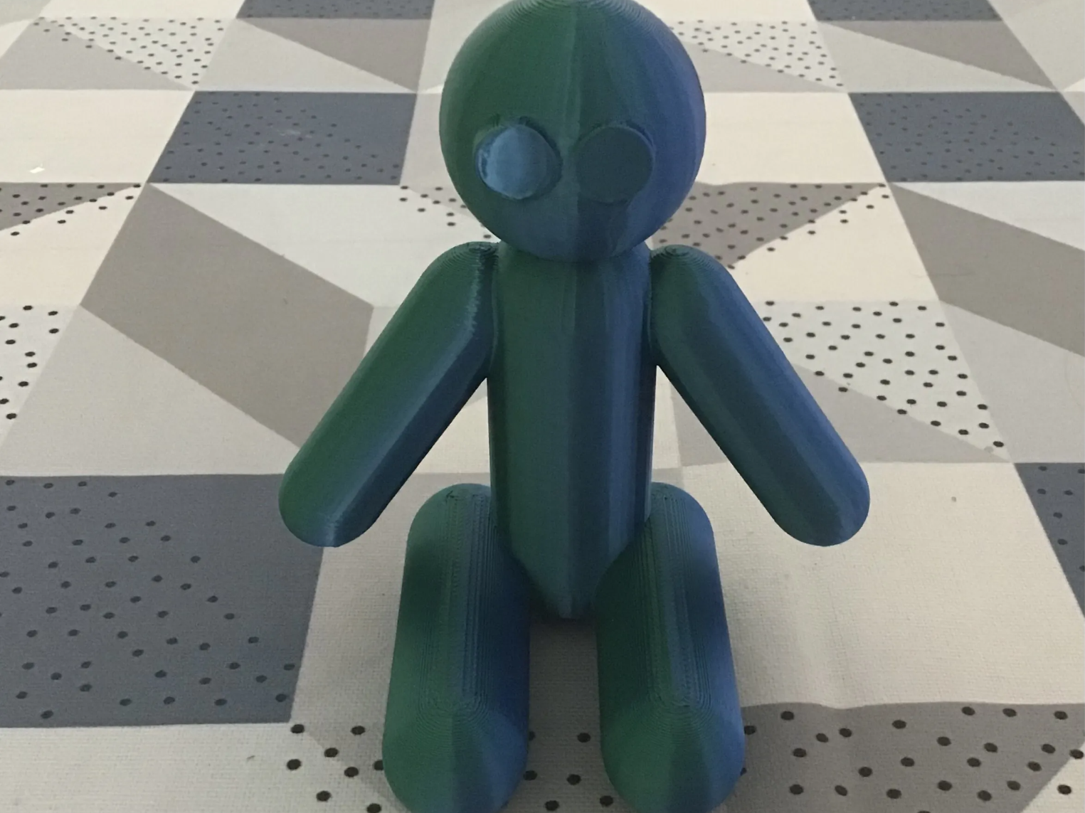 Monigote sentado