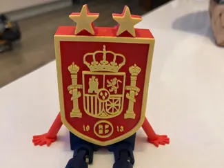 escudo de España de futbol con piernas
