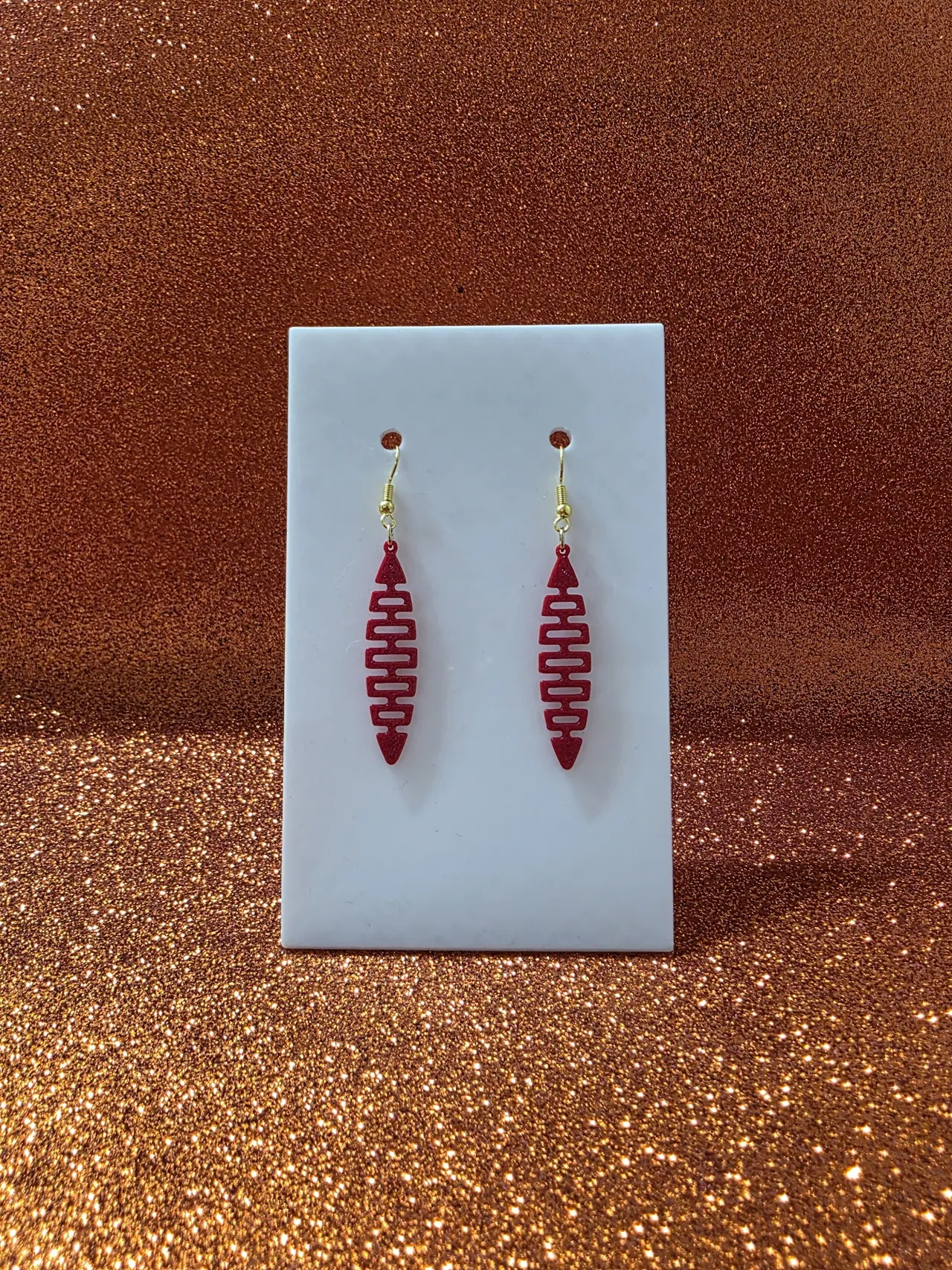 Geometric fish earrings view 2