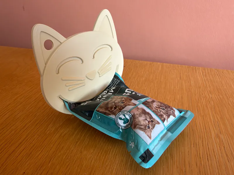 racloir à pâtée pour chat