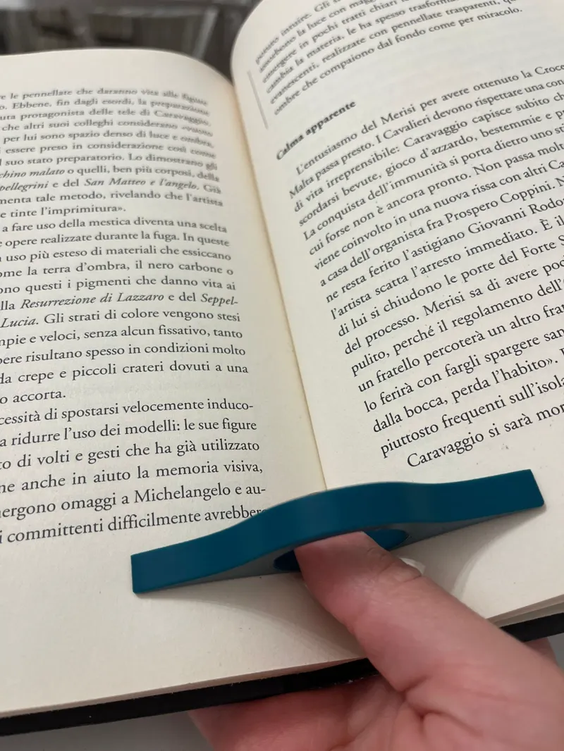 Page holder / One hand book holder