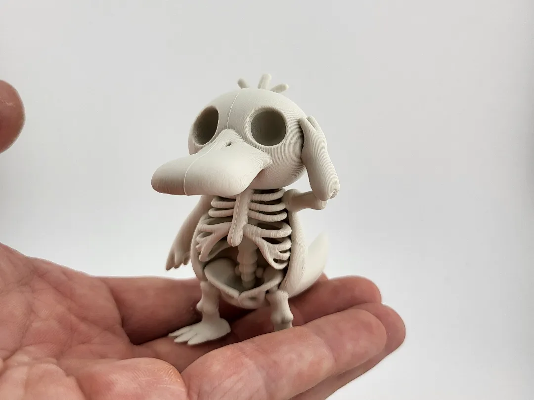 Psyduck Skeleton Figure Kawaii Pokémon Style cute by Mad power MakerWorld: Download Free 3D Models - 3D model önizlemesi