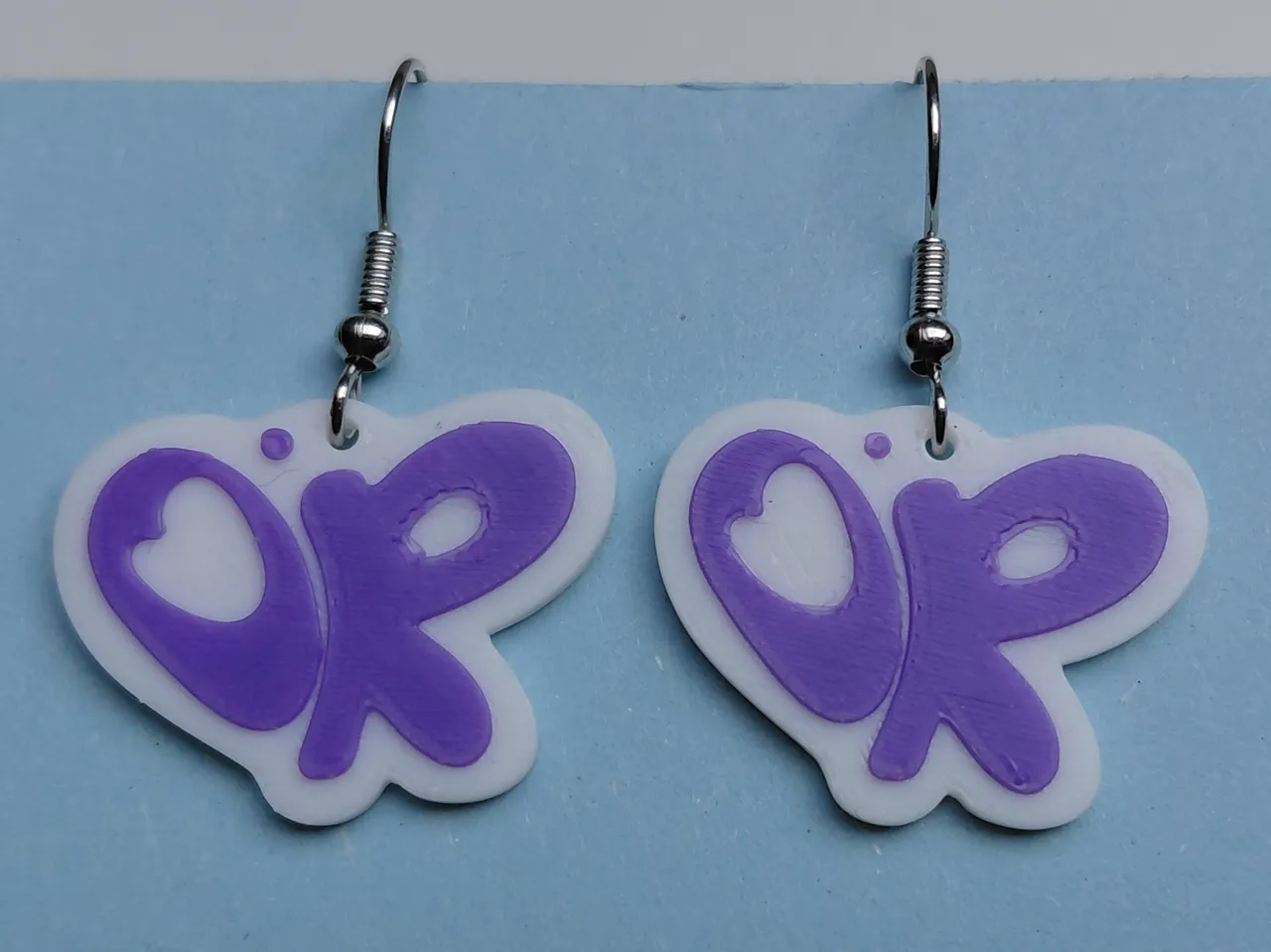 Olivia Rodrigo logo earrings / keychain view 3