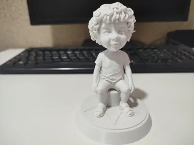 Sitting child (customizable name on base)