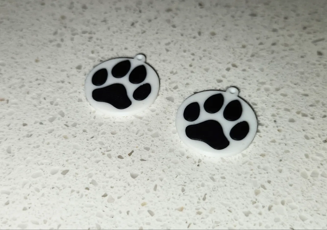 Dog paw print earrings view 2