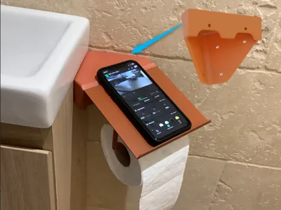 Toilet paper holder corner support for smartphone or tablet