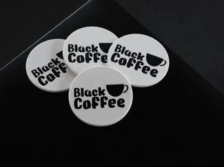 Black coffee coasters/maker coin.