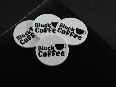 Black coffee coasters/maker coin.