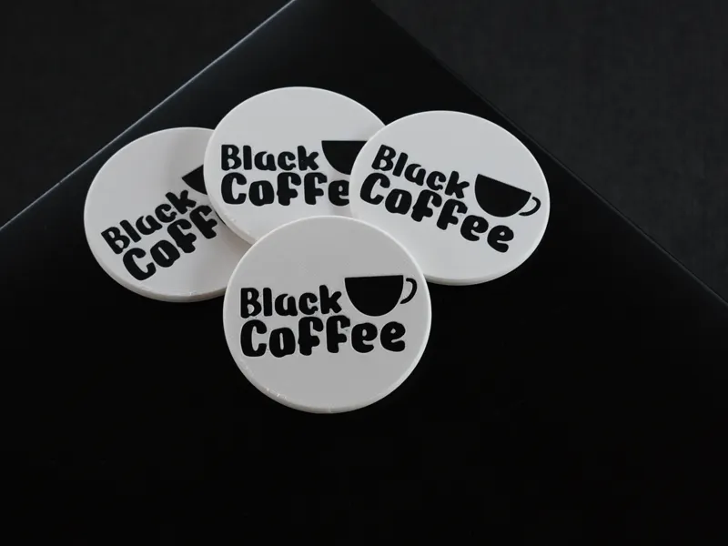 Black coffee coasters/maker coin.
