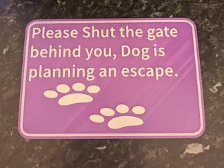 Shut the gate dog sign