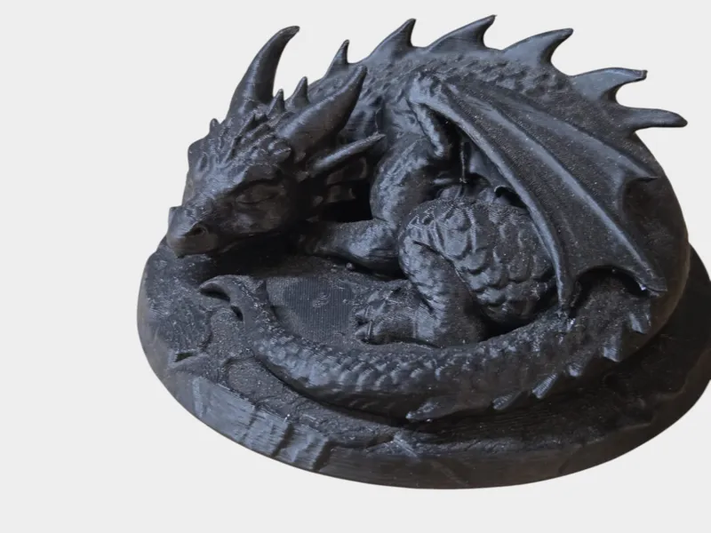 Sleeping dragon on rock
