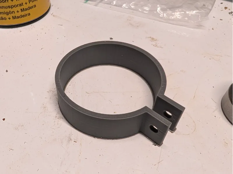 Piston ring compressor