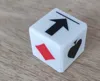 Card-colored cube with arrow symbols for assembly