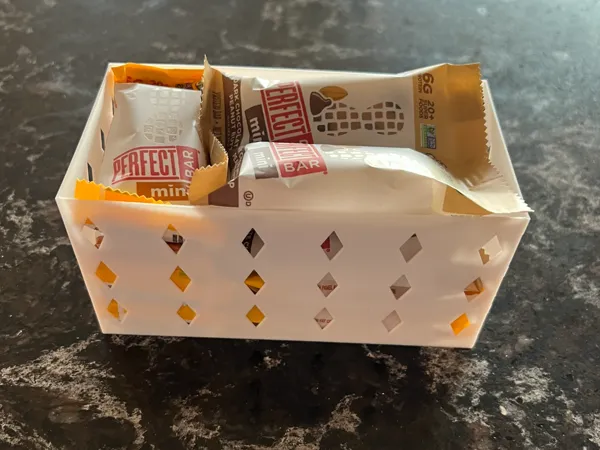 Boîte de rangement pour barres