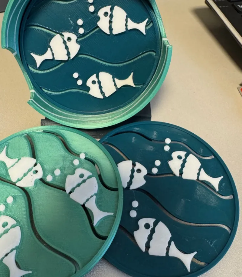 Set of coasters and coaster holder with fish