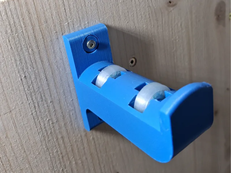 Wall mounted filament spool holder