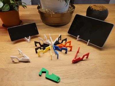 Foldable keychain with phone / tablet stand 