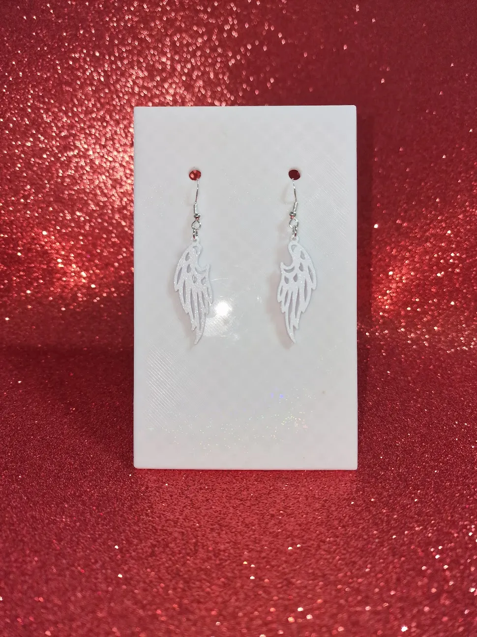 Angel wing earrings view 2