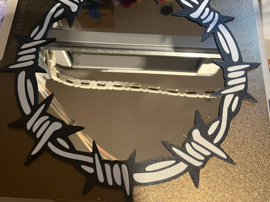 Barbed wire mirror