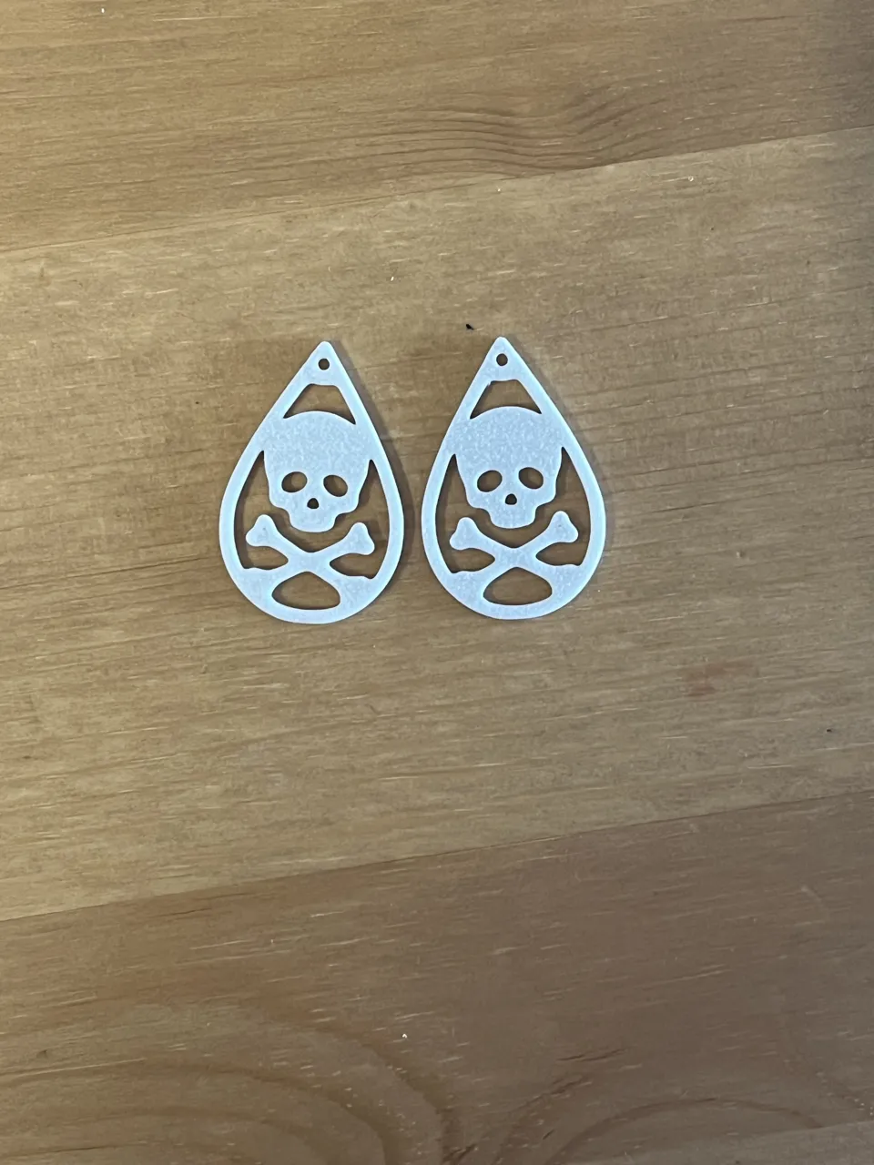 skull earrings view 2