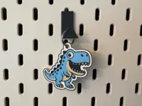 Dino Schlüsselanhänger im freundlichen Comic-Stil