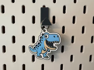 Dino Keychain in friendly comic style