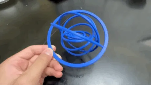 Fidget cadre circulaire à torsion